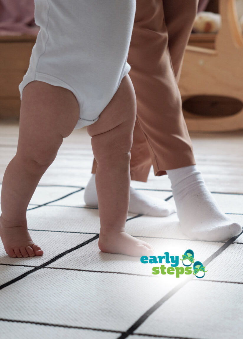 Baby practicing first steps with adult support, featuring the Early Steps logo.